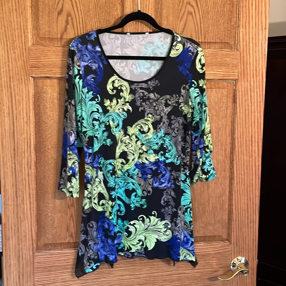 Soft, silky dressy shark bite top